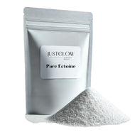 JustGlow cosmetic-grade Ectoine powder in a resealable white pouch for skincare formulation